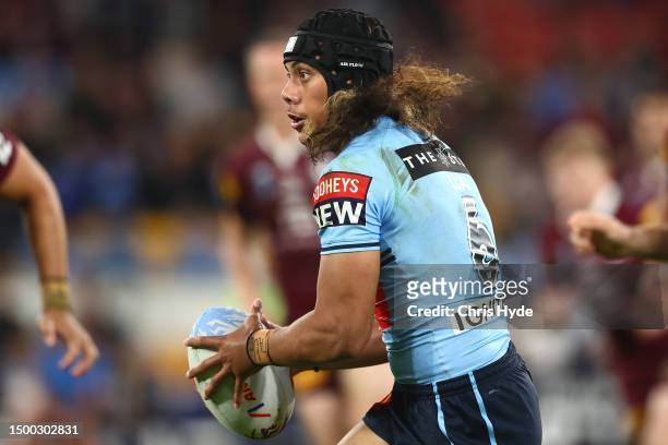 Jarome Luai of the Blues runs the ball during game two of the State of Origin series between the Queensland Maroons and the New South Wales Blues at...