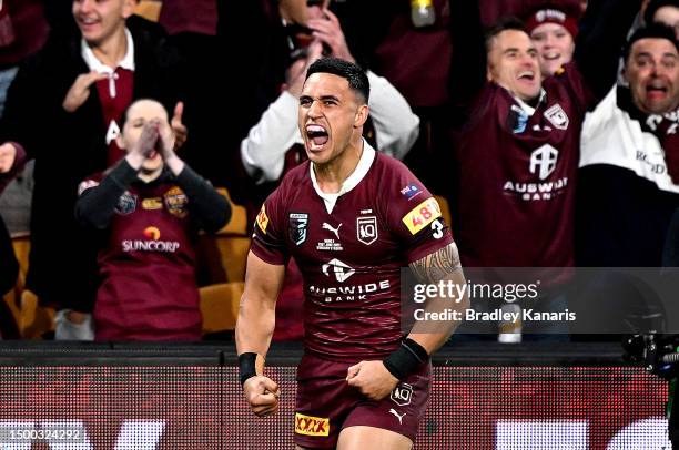 Valentine Holmes of Queensland celebrates after scoring a try during game two of the State of Origin series between the Queensland Maroons and the...