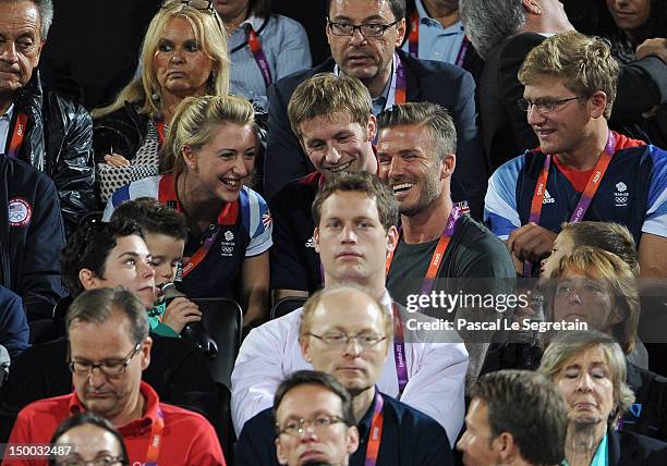 Cruz Beckham, British cyclists Laura Trott and Jason Kenny, David Beckham and Romeo Beckham during the Beach Volleyball on Day 12 of the London 2012...