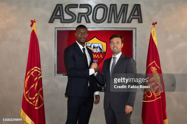 Roma new signing Evan Ndicka, with AS Roma General Manager Triago Pinto, signs his contract with the club at Centro Sportivo Fulvio Bernardini on...