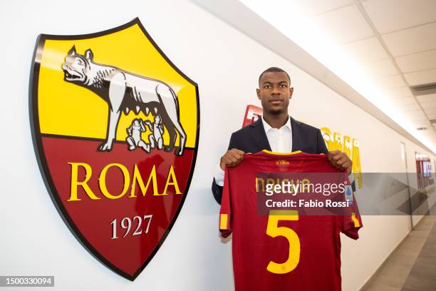 Roma new signing Evan Ndicka poses with his new jersey at Centro Sportivo Fulvio Bernardini on June 21, 2023 in Rome, Italy.