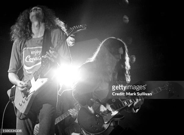 Musicians Allen Collins and Gary Rossington perform with band Lynyrd Skynyrd in Los Angeles, CA 1977.