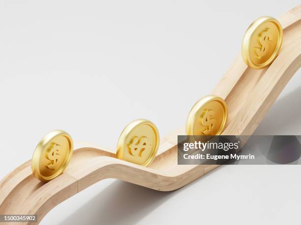 3d image of rolling coins along a path. - credit risk stock pictures, royalty-free photos & images