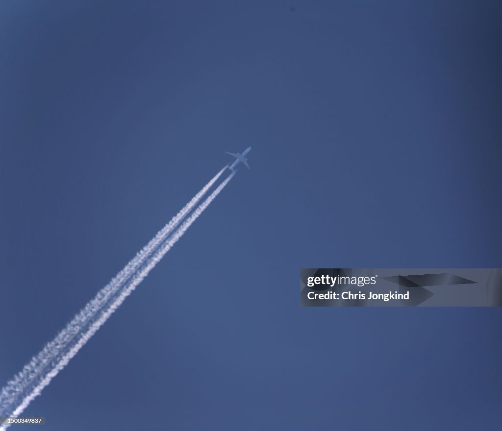 Jet Engine Contrail Twinengine Passenger Airplane Leaving Contrail Against Blue Sky High ...