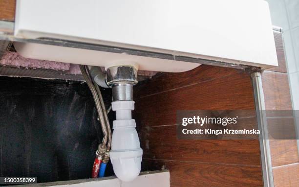 under the sink - under sink foto e immagini stock