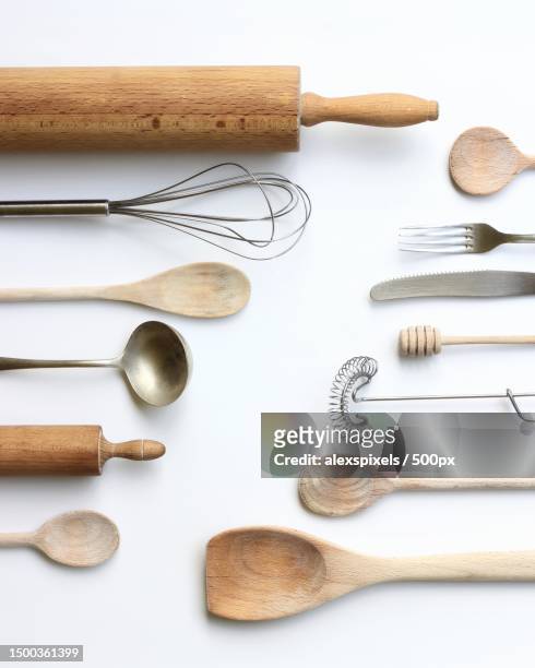 directly above shot of kitchen utensils on white background,croatia - träsked bildbanksfoton och bilder