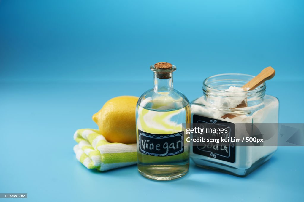Close-up of baking soda with text against blue background