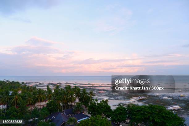 high angle view of sea and buildings against sky,panglao,bohol,philippines - bohol stock pictures, royalty-free photos & images