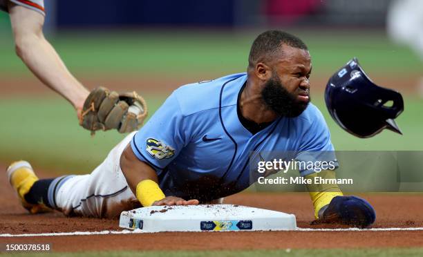 Manuel Margot of the Tampa Bay Rays slides into third in the second inning during a game against the Baltimore Orioles at Tropicana Field on June 21,...