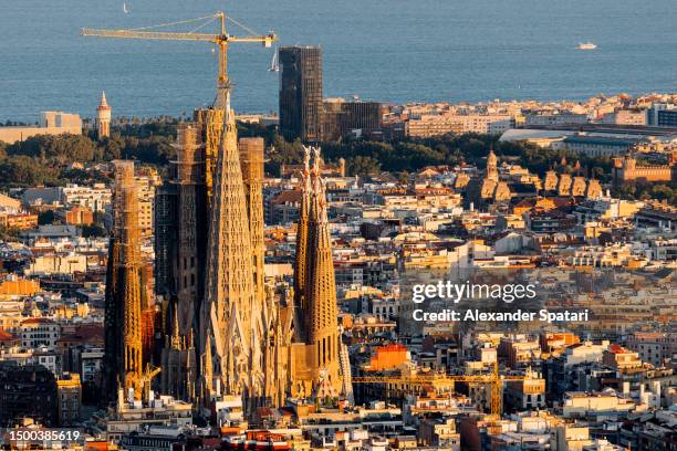 sagrada familia and barcelona skyline high angle view, spain - sagrada familia foto e immagini stock