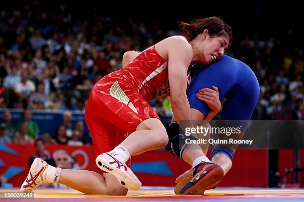 Saori Yoshida of Japan and Yuliya Ratkevich of Azerbaijan compete in the Women's Freestyle 55 kg Wrestling on Day 13 of the London 2012 Olympic Games...