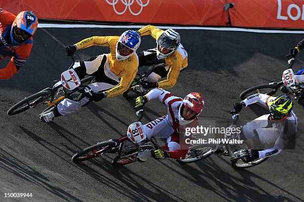 Sam Willoughby of Australia and Maris Strombergs of Latvia lead the field out of the berm during the Men's BMX Cycling Quarter Finals on Day 13 of...