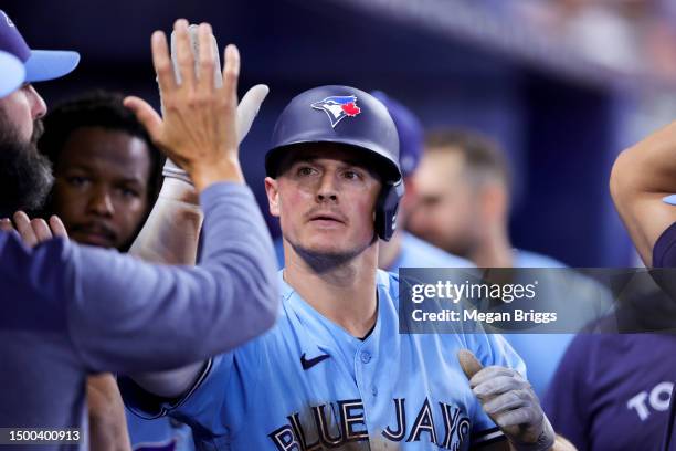 Matt Chapman of the Toronto Blue Jays celebrates after hitting a home run against the Miami Marlins during eighth inning at loanDepot park on June...