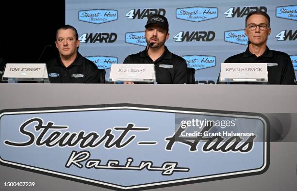 Co-owner Tony Stewart, driver Josh Berry and driver Kevin Harvick answer questions during a press conference introducing Berry as the new driver of...