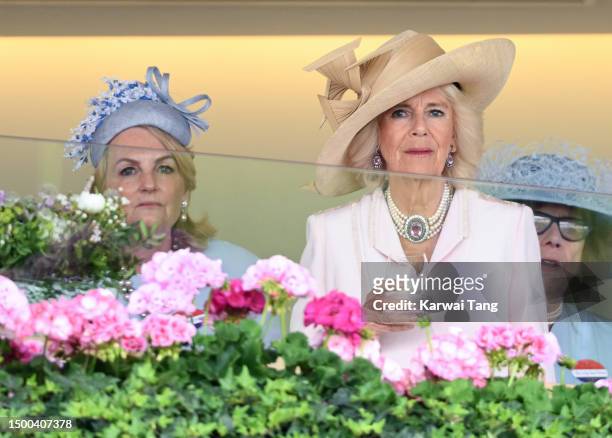 Madeleine Lloyd Webber and Queen Camilla watch a race during day two of Royal Ascot 2023 at Ascot Racecourse on June 21, 2023 in Ascot, England.