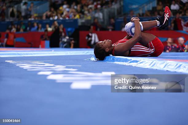 Jackeline Renteria Castillo of Colombia lays on the mat in the Women's Freestyle 55 kg Wrestling on Day 13 of the London 2012 Olympic Games at ExCeL...