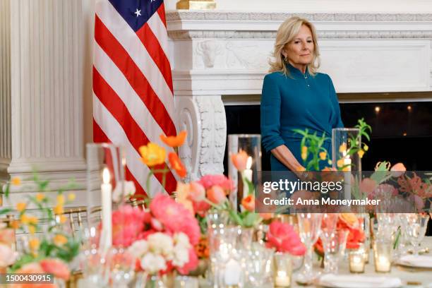 First lady Jill Biden looks on at the table setting during a media preview of the state dinner for Thursday’s visit by Indian Prime Minister Narendra...
