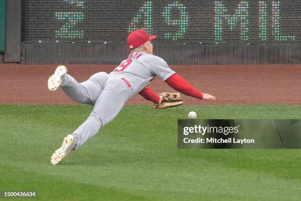 Lars Nootbaar of the St. Louis Cardinals can't get to a ball hit by Jeimer Candelario of the Washington Nationals in the sixth inning at Nationals...