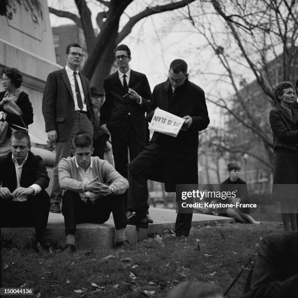 People in Lafayette Park after the assassination of President John Fitzgerald Kennedy on November 23, 1963 in Washington DC, United States.