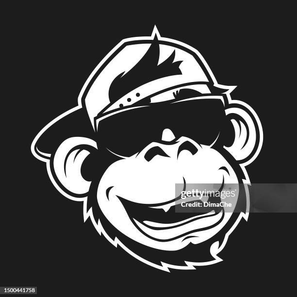 stockillustraties, clipart, cartoons en iconen met monkey in cap and sunglasses - outline cut out silhouette. ape, monkey, or gorilla head character mascot - monkey wearing glasses