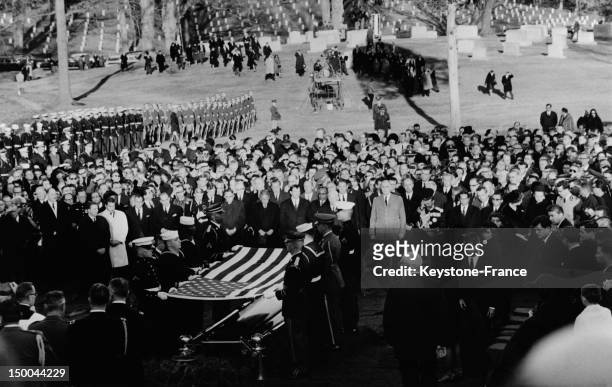 Family and chiefs of state pay their last respects in front of the coffin of late US President John Fitzgerald Kennedy at the cemetery, during his...