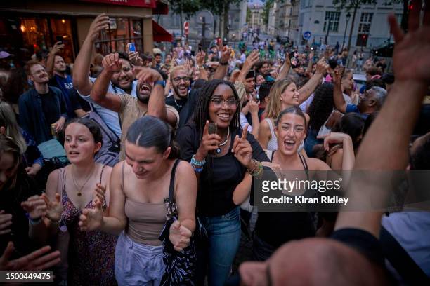 Parisians dance in the street in Montmartre as part of Fête de la Musique a city wide celebration of free music on June 21, 2023 in Paris, France....