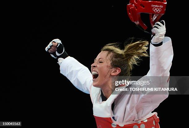 Great Britain's Jade Jones celebrates her victory over Taiwan's Tseng Li-Cheng at the end of their women's taekwondo semi-final bout in the under 57...