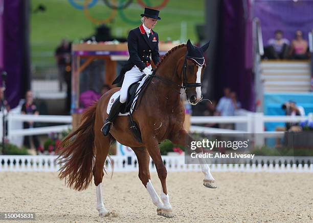 Laura Bechtolsheimer of Great Britain riding Mistral Hojris competes in the Individual Dressage on Day 13 of the London 2012 Olympic Games at...