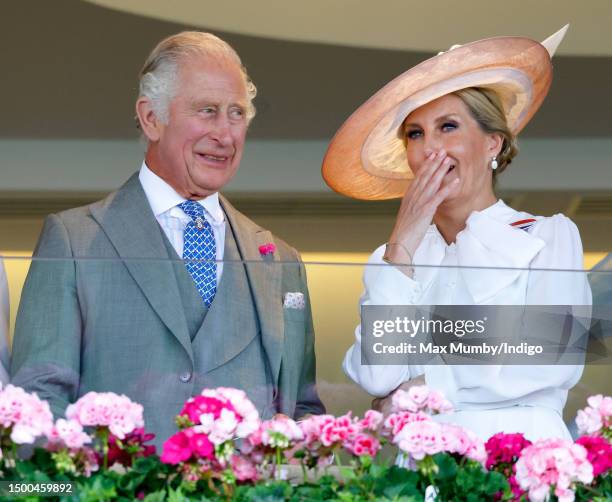 King Charles III and Sophie, Duchess of Edinburgh watch his horse 'Circle of Fire' run in 'The Queen's Vase' on day 2 of Royal Ascot 2023 at Ascot...