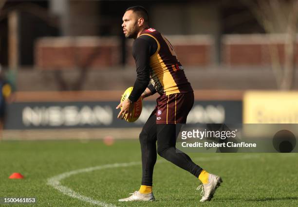 Jarman Impey of the Hawks controls the ball during a Hawthorn Hawks AFL training session at Waverley Park on June 22, 2023 in Melbourne, Australia.