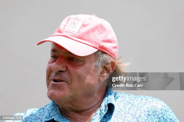 Commentator Chris Berman looks on before teeing off during a practice round prior to the Travelers Championship at TPC River Highlands on June 21,...