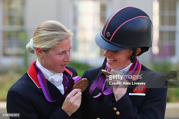 Gold medallist Charlotte Dujardin of Great Britain riding Valegro and bronze medallist Laura Bechtolsheimer of Great Britain riding Mistral Hojris...