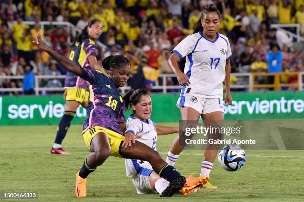 Linda Caicedo of Colombia fights for the ball with Rosario Vargas of Panama during a friendly match between Colombia and Panama at Estadio Pascual...