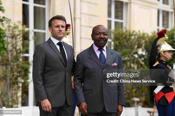 French President Emmanuel Macron welcomes Gabonese President Ali Bongo Ondimba for a meeting at the Elysee Palace on June 21, 2023 in Paris, France.