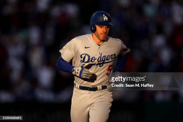 Freddie Freeman of the Los Angeles Dodgers rounds second base after connecting for a solo homerun during the fourth inning of a game against the Los...
