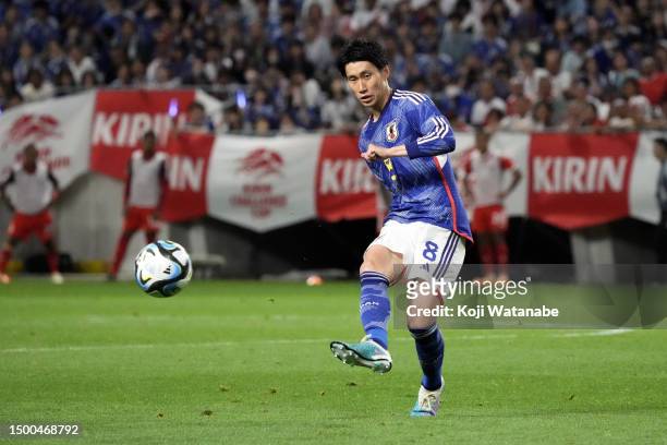 Daichi Kamada of Japan in action during the international friendly match between Japan and Peru at Panasonic Stadium Suita on June 20, 2023 in Suita,...
