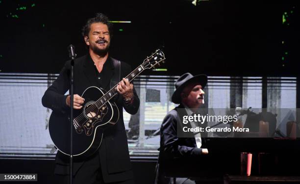 Ricardo Arjona performs during his "Blanco Y Negro: Volver" Tour at Amway Center on June 21, 2023 in Orlando, Florida.