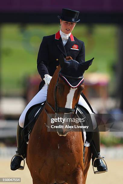 Laura Bechtolsheimer of Great Britain riding Mistral Hojris competes in the Individual Dressage on Day 13 of the London 2012 Olympic Games at...