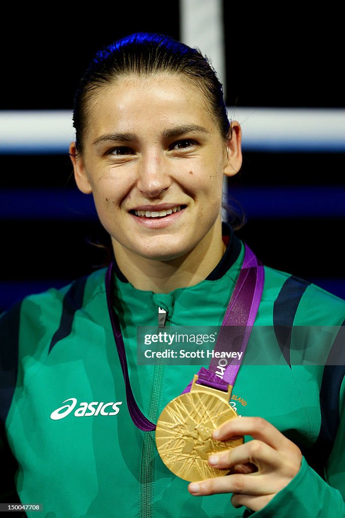 Gold medalist Katie Taylor of Ireland celebrates on the podium during