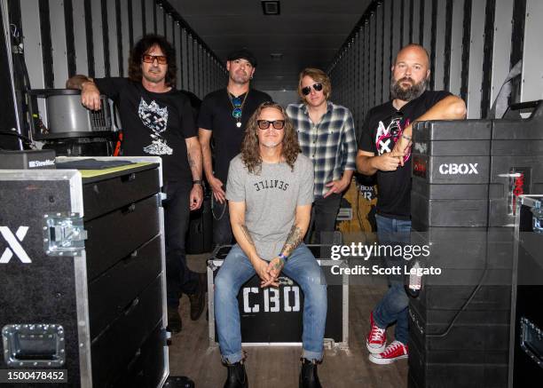 Adam Kury, Brian Quinn, Kevin Martin, Island Styles and BJ Kerwin of Candlebox pose backstage during their 30th Anniversary tour at Michigan Lottery...