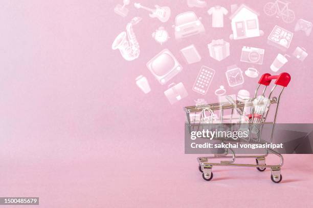 online shopping concept - shopping cart stock-fotos und bilder