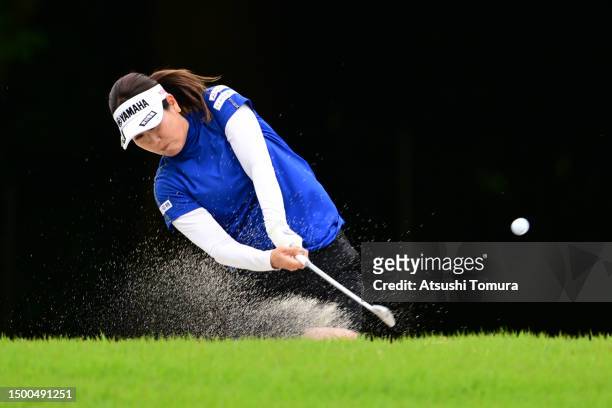 Mami Fukuda of Japan hits her second shot out from a bunker on the 3rd hole during the first round of Earth Mondahmin Cup at Camellia Hills Country...