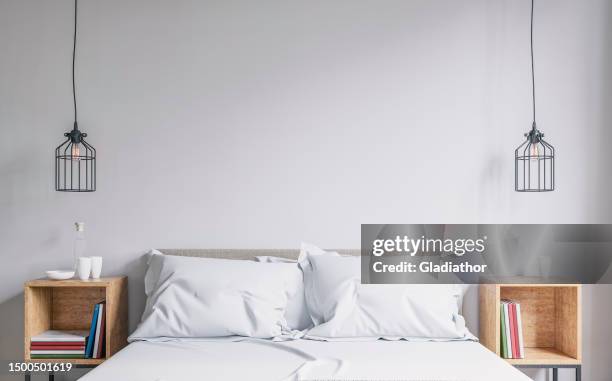 front view of a simple bedroom in scandinavian style - bed on white stock pictures, royalty-free photos & images