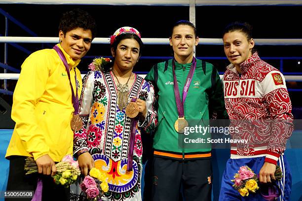 Bronze medalist Adriana Araujo of Brazil, bronze medalist Mavzuna Chorieva of Tajikistan, gold medalist Katie Taylor of Ireland and silver medalist...
