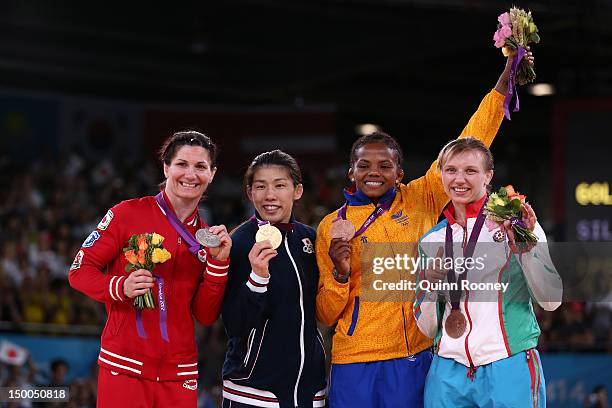 Silver medalist Tonya Lynn Verbeek of Canada, Gold medalist Saori Yoshida of Japan, Bronze medalist Jackeline Renteria Castillo of Colombia, and...