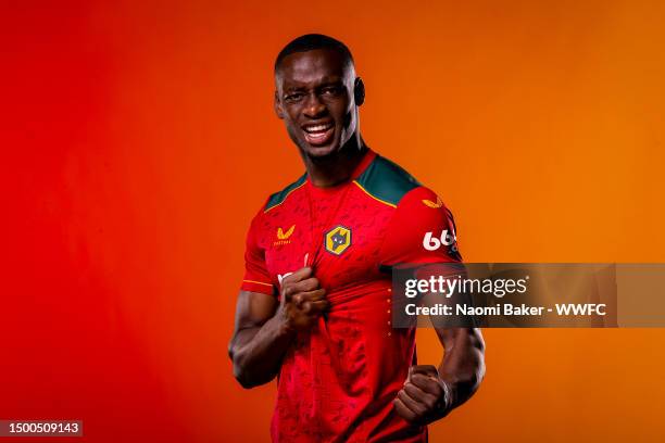 Toti Gomes of Wolverhampton Wanderers poses for a portrait in the Wolverhampton Wanderers 2023/2024 away kit at The Sir Jack Hayward Training Ground...