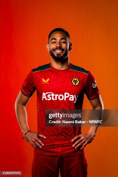 Matheus Cunha of Wolverhampton Wanderers poses for a portrait in the Wolverhampton Wanderers 2023/2024 away kit at The Sir Jack Hayward Training...