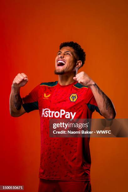 Joao Gomes of Wolverhampton Wanderers poses for a portrait in the Wolverhampton Wanderers 2023/2024 away kit at The Sir Jack Hayward Training Ground...