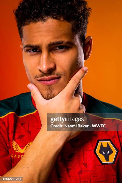 Joao Gomes of Wolverhampton Wanderers poses for a portrait in the Wolverhampton Wanderers 2023/2024 away kit at The Sir Jack Hayward Training Ground...