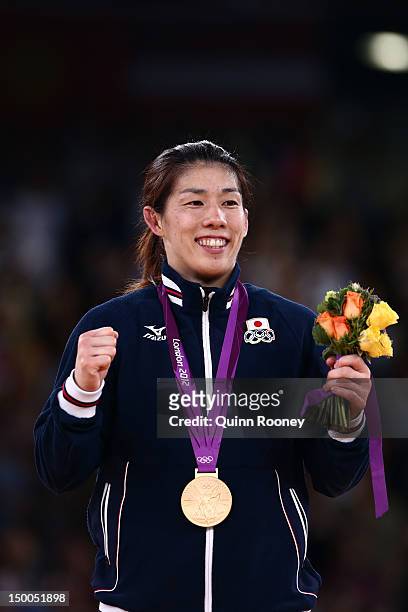 Saori Yoshida of Japan celebrates winning the gold medal in the Women's Freestyle 55 kg Wrestling on Day 13 of the London 2012 Olympic Games at ExCeL...
